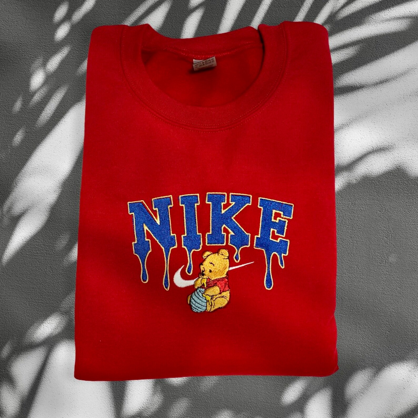 nike winnie the pooh crewneck