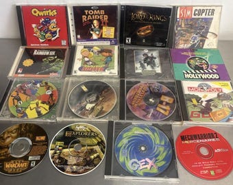 Lotto di 17 giochi vintage per PC - Vari generi, Tomb Raider, TLOTF, GEX, Warcraft ecc.