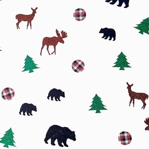 May include: A white background with a repeating pattern of green pine trees, brown deer, brown moose, black bears, and red and black plaid circles.