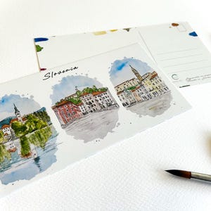 スロベニアの町のポストカード - ブレッド、リュブリャナ、ピランの水彩画アートプリント - スロベニア旅行のお土産 - Nessa Artによるイラスト入りポストカード