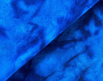 May include: Blue tie-dye fabric with a dark blue swirl pattern.