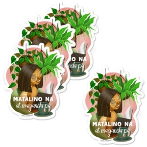 May include: Four pink and white stickers with a cartoon illustration of a woman reading a book with hanging plants in the background. The text on the sticker reads "MATALINO NA at maganda pa" and "ETHEL MARTINEZ".