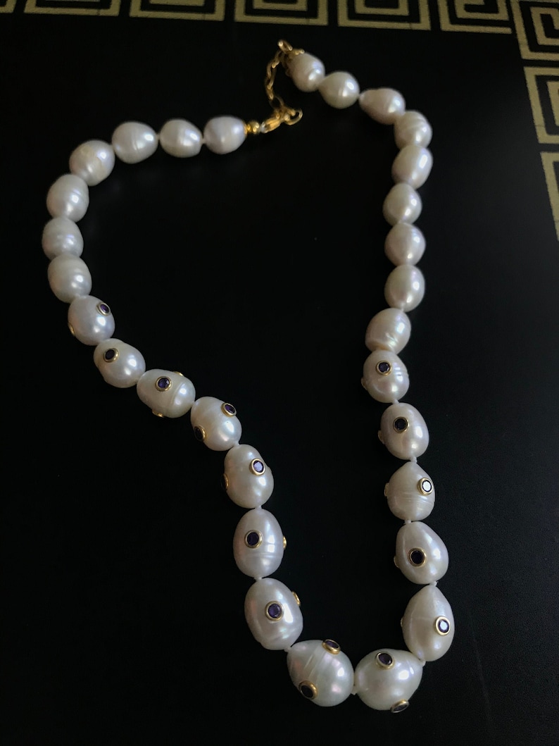 Amethyst stone carved necklace on baroque pearl