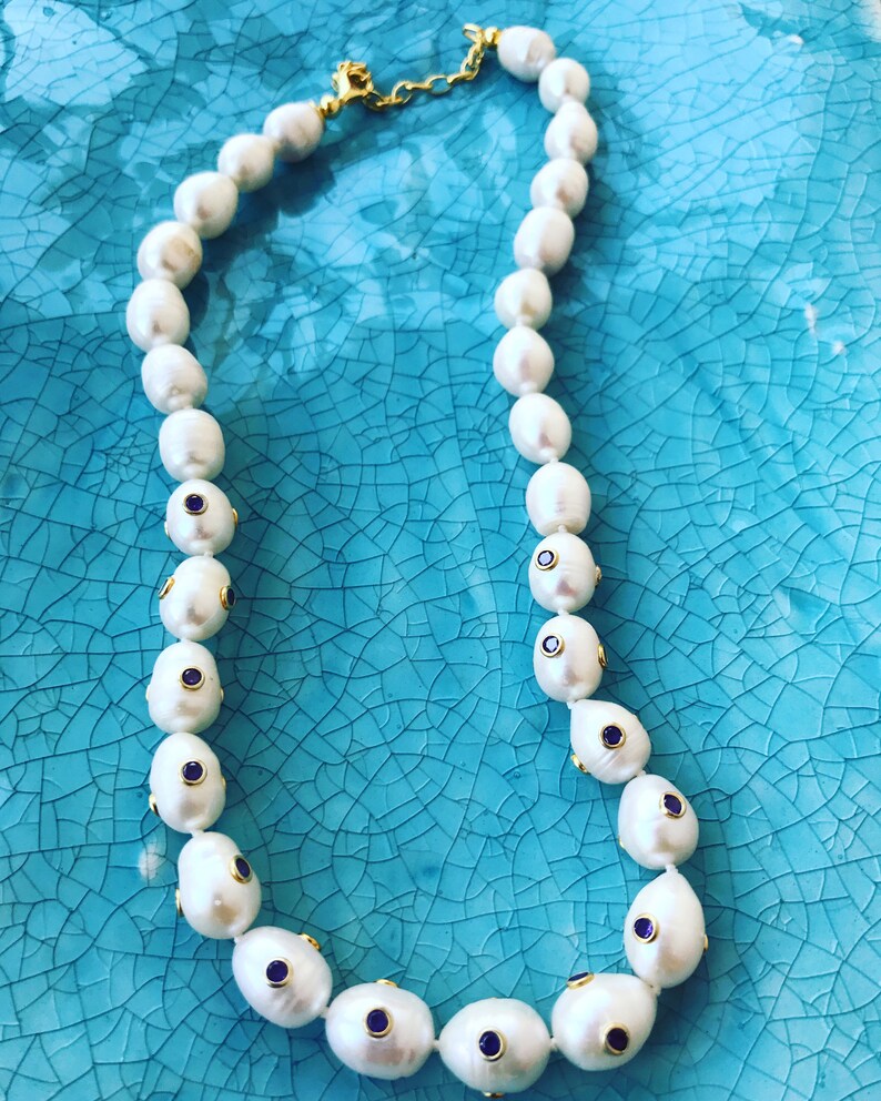 Amethyst stone carved necklace on baroque pearl