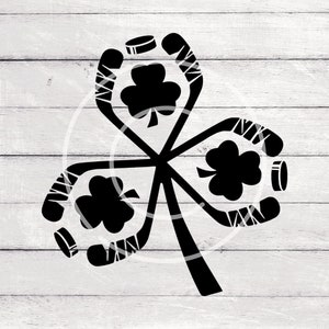 Peut inclure: Silhouette noire et blanche d'un trèfle à quatre feuilles avec des bâtons de hockey formant les feuilles et des rondelles aux extrémités des bâtons.