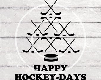 May include: Black and white illustration of hockey sticks arranged in a Christmas tree shape with a hockey puck at the bottom. The text "HAPPY HOCKEY DAYS" is below the illustration.