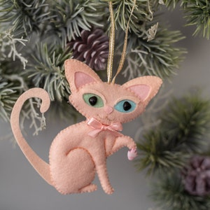 Christmas sphynx cat ornament made from felt. Handsewn.