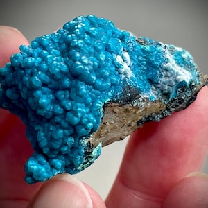 High Grade Stunning Bright Blue Botroidal Chrysocolla from the Tentadora Mine in Peru. Chrysocolla Nodules on Quartz Matrux with Limonite