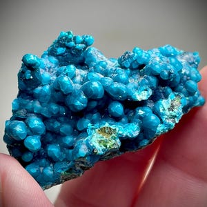 High Grade Stunning Bright Blue Botroidal Chrysocolla from the Tentadora Mine in Peru. Chrysocolla Nodules on Quartz Matrux with Limonite