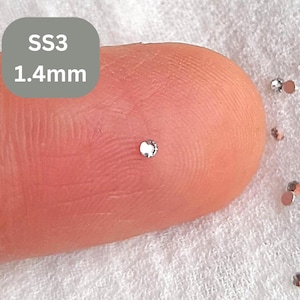 1.4mm crystal clear rhinestones , tiny flat backs , SS3
