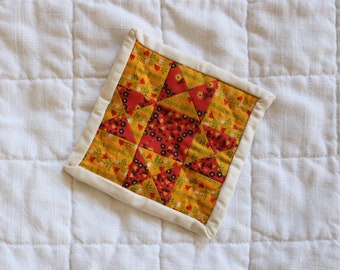 Quilted Coaster 02 - bright yellow and red reclaimed floral cotton Ohio star, hand-quilted