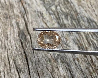 1.45 Carat Oval Natural Diamond: Fancy Peach Brownish Certified Diamond