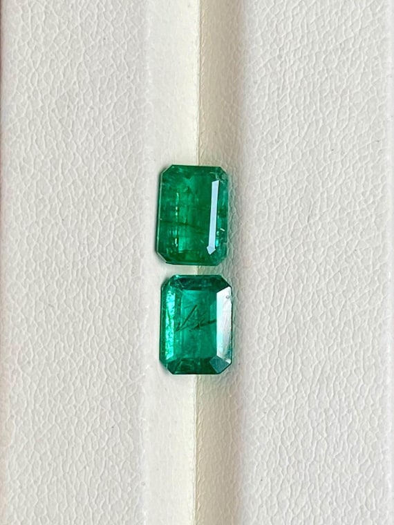 Emerald Cut Zambian Emerald Pair: 2.22 Carats, 7.5x5.3mm
