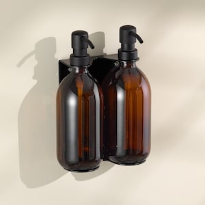 Support mural pour distributeur de savon : acier inoxydable noir, bouteilles en verre ambré