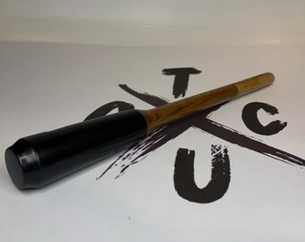 Turkey Pot Call Striker Ebony, Teak and Black and white ebony tip.