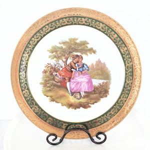 La Reine Limoges France porcelain plate gilt fragonard courting couple rehausse main dish
