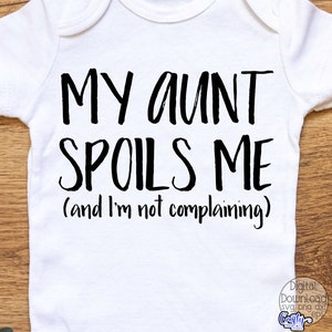 May include: White baby onesie with black text that reads "My aunt spoils me (and I'm not complaining)"