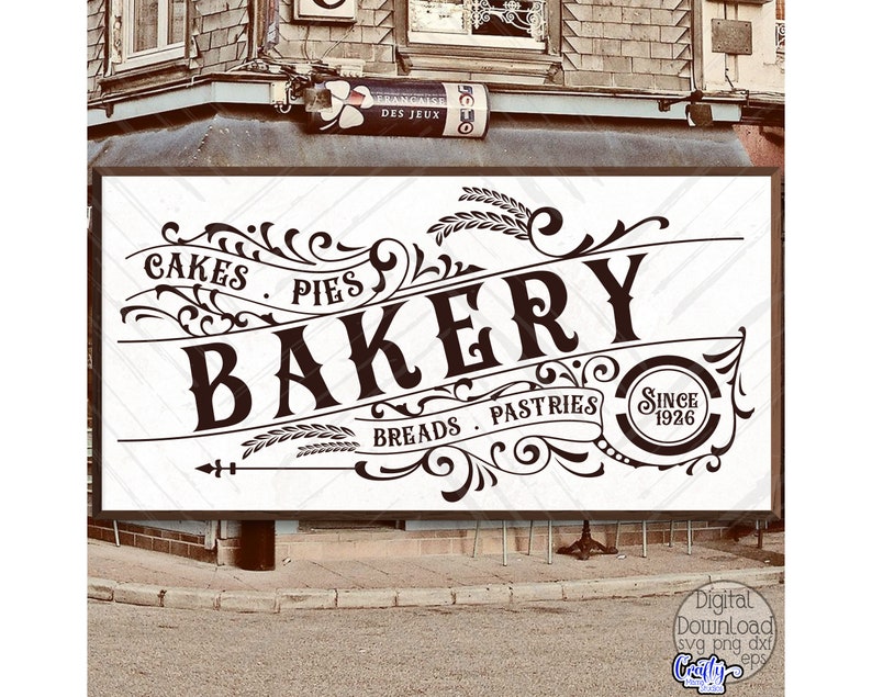 May include: Black and white sign with ornate lettering that reads "Cakes Pies Bakery Breads Pastries Since 1926".