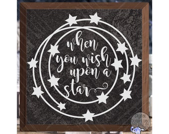 May include: Square wooden sign with a dark gray background and white text that reads "when you wish upon a star." The text is surrounded by a white circular design with star accents. The sign has a brown wooden frame.