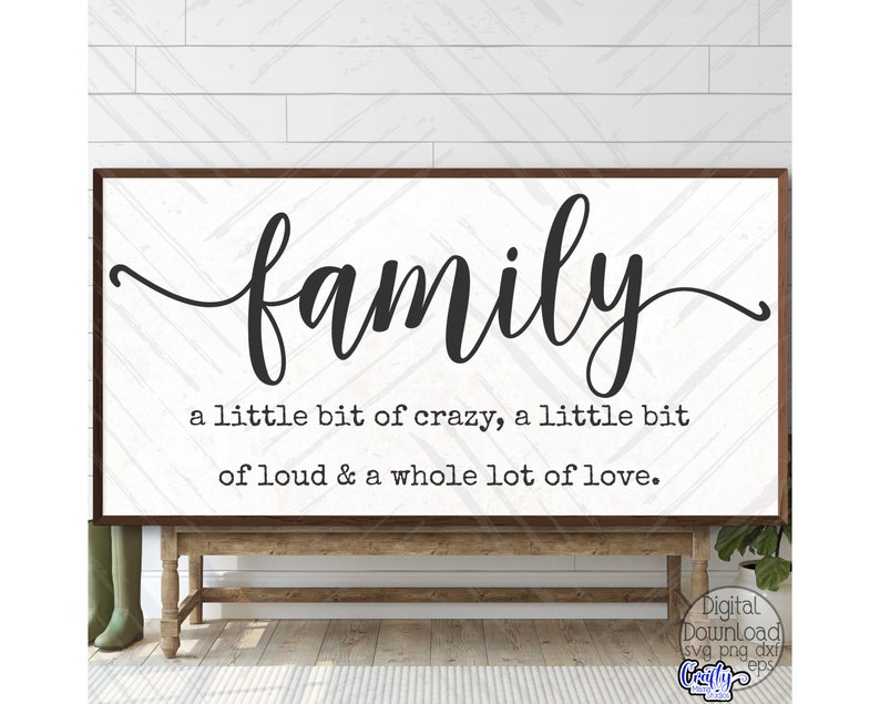 May include: A white sign with black text that reads "family a little bit of crazy, a little bit of loud & a whole lot of love."