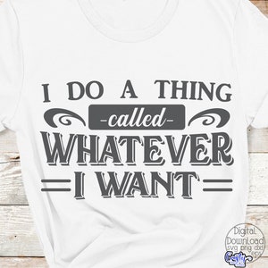 May include: White t-shirt with the phrase "I DO A THING -called- WHATEVER I WANT" in dark gray lettering. The text is centered and features decorative elements. The shirt is a casual wear item.