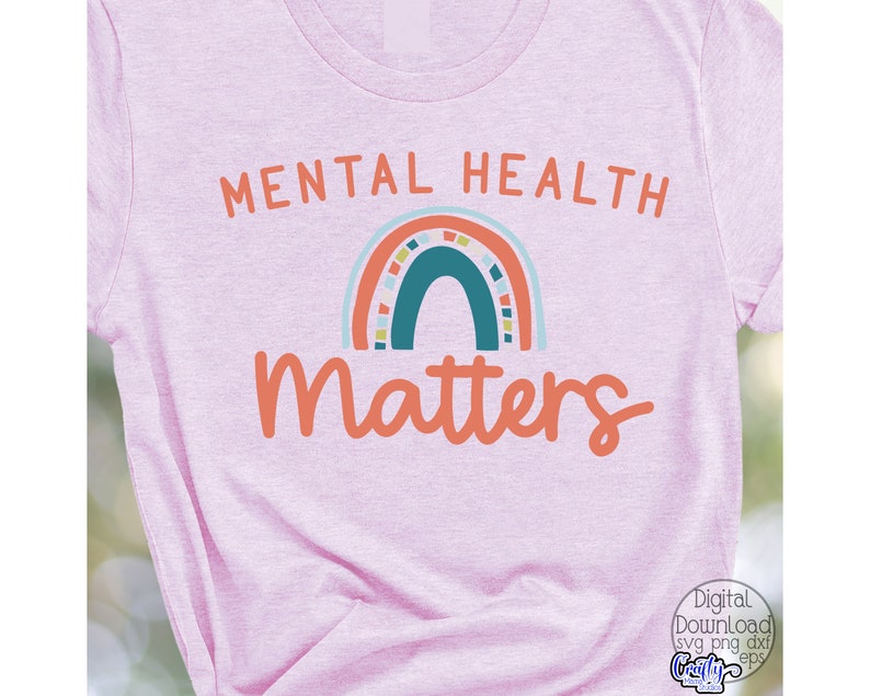 May include: Pink t-shirt with the text "Mental Health Matters" in orange and white. A rainbow with blue, green, orange, and yellow colors is above the text.