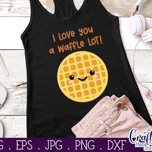 May include: Black tank top with the text "I Love you a Waffle LOT!" in white. A yellow waffle with a smiling face is in the center of the tank top.