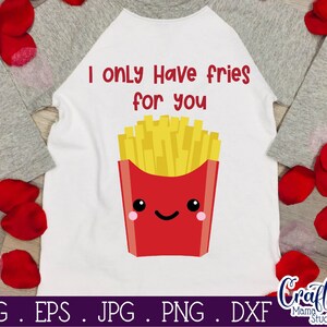 May include: A white t-shirt with a grey raglan sleeve design. The shirt has a red and yellow cartoon image of french fries with a smiling face and the text "I only have fries for you".