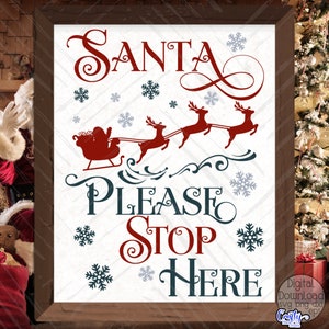 May include: A white sign with red and blue text that says "Santa Please Stop Here". The sign has a red and white illustration of Santa Claus in his sleigh with reindeer.