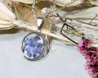 forget-me-not flower in cast resin gold