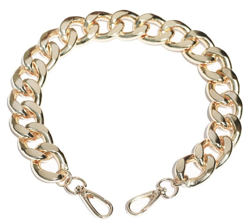 clear purse with gold chain