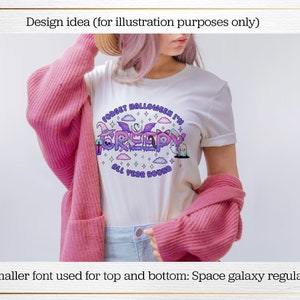 May include: White t-shirt with a graphic design that says "Forget Halloween I'm Creepy All Year Round". The graphic features a purple, pink and blue colour scheme with cartoon monsters and stars. The text at the top and bottom is in a smaller font.