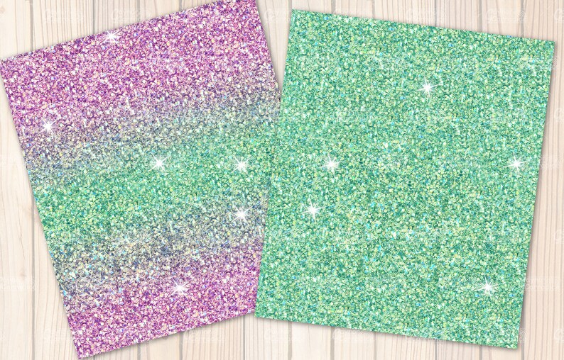 May include: Two sheets of glitter paper. One sheet has a gradient of purple to green, and the other is solid green. Both sheets have sparkling highlights and are set against a light wood grain background.