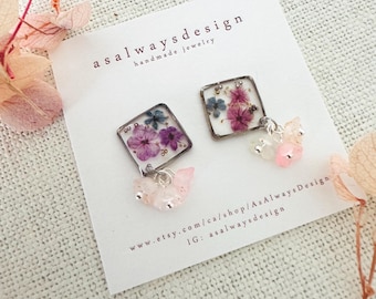 Pendientes colgantes de resina con flores naturales, joyería botánica inspirada en la naturaleza, ganchos de latón.