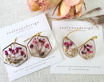 Hangoorbellen van echt bloemhars, botanische natuursieraden, messing details