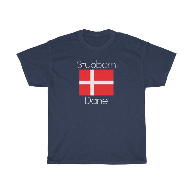 May include: A navy blue t-shirt with the text "Stubborn Dane" and a red and white Danish flag graphic.