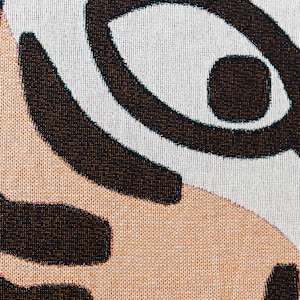 May include: Close-up of a woven fabric with a black and white geometric pattern. The fabric has a textured surface and a subtle sheen.