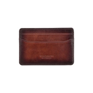 May include: A brown leather card holder with the text "VISCONTI LONDON" embossed on the front.