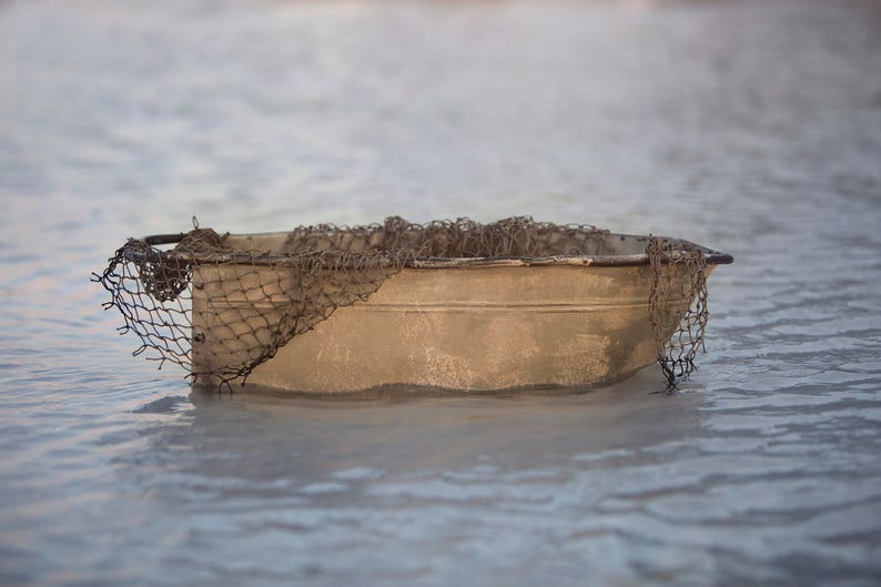 Metal Boat floating in bay with net digital backdrop/digital background image 1