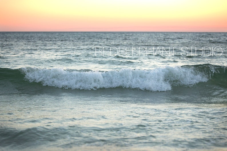 Ocean wave at Sunset by the beach with an orange sky digital background/digital backdrop image 1