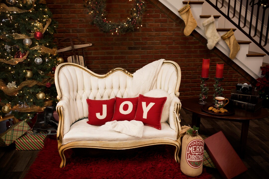 Christmas Living Room Background With Tree, Presents, Wreath, JOY Pillows, and Vintage Sofa