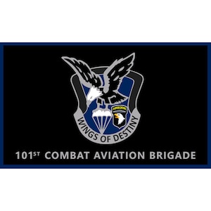 May include: A black and blue flag with a silver eagle and the words "Wings of Destiny" and "101st Combat Aviation Brigade".