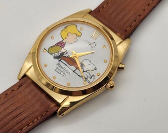 Orologio musicale vintage Armitron Peanuts Snoopy Schroeder suona musica! Tiene il tempo!