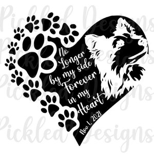May include: Black and white silhouette of a dog's head inside a heart shape with paw prints around the outside. The text reads "No longer by my side Forever in my heart Nov. 1, 2021".