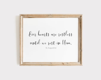 May include: A framed print with a quote by St. Augustine: "Our hearts are restless until we rest in Him."