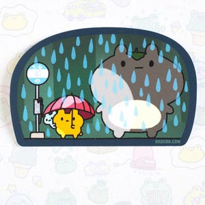 May include: A cartoon illustration of two animals standing at a bus stop in the rain. One animal is holding an umbrella and the other is standing in the rain. The text "RRDDBB.COM" is in the bottom right corner of the image.