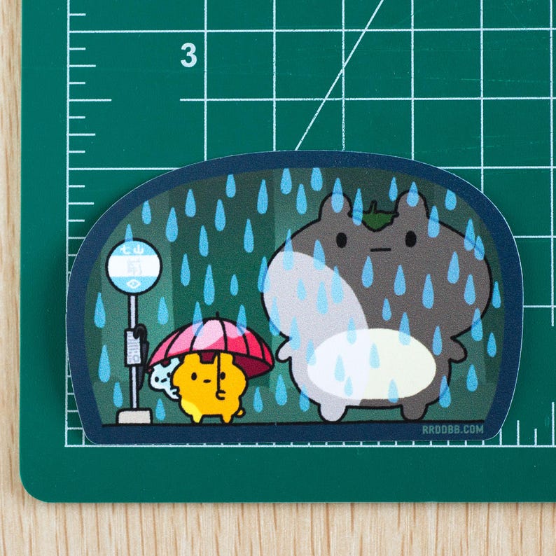 May include: A cartoon illustration of two animals standing under an umbrella in the rain. The animal on the left is yellow and wearing a red umbrella. The animal on the right is gray and has a green leaf on its head. The background is a dark green with blue raindrops.