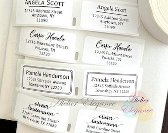 May include: A sheet of white address labels with black text. The labels are for different people and addresses. The text on the labels includes names, street addresses, cities, counties, and postcodes. The labels are printed with a professional, clean font. The labels are designed for use with a standard label printer.
