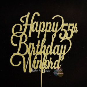 May include: Gold glitter cake topper with the text "Happy 55th Birthday Winford".