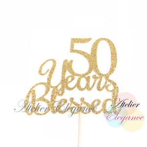 May include: Gold glitter cake topper with the text "50 Years Blessed".